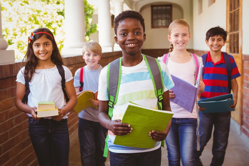 School children with backpacks